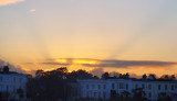 Sunset behind the seaside terrace