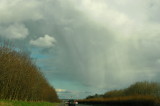 White clouds and rain on the motorway