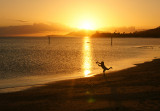 Casting at sunset Maunalua Bay, Oahu.