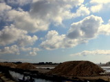 mountains of salt covered with red roof tiles. 