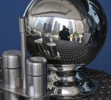 A reflection of yours truly on table-top chrome sphere!