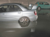 Some quite nice cars are getting flooded.