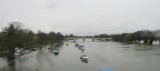 Looking down river at high tide on a cold grey day.