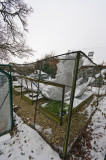 Snow on fruit cage