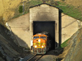 Poking out of the west portal of Bozeman Tunnel into the setting sun. 5/28/09