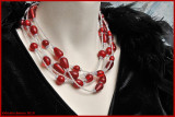 red glass beads and small rocailles