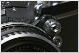Shutter button with sliding lock