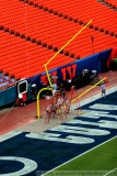 Installing the goal post in the Colts end zone