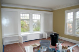 living room, looking south toward built-in bookcases & window seat