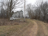 house from lane near road - 1