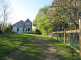 May 13 - primer on front - dog fence under construction