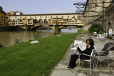 Morning newspaper by the river