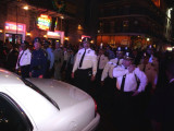 Third  Wave of Police Clearing Bourbon St. at Midnight