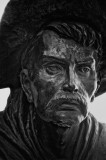 Portrait of a bronze cowboy