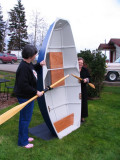 And now eight bolts join halves to make a dinghy; oars in position for tandem use.