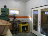 Pan around walls of shop, this and next five photos.