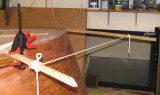 Nails end a few inches before the tail, so it can be planed down some, demanding some creative clamping.