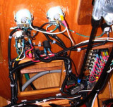 Detail of fuel gauges; accessory plugin below gauges; oil pressure / coolant temp buzzer under steering right side.