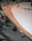 Surface scraped of paint and sanded.