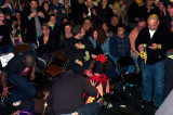 Crazy Chicken thrashing his opponent in the crowd.