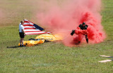 Fla .Airshow - US ARMY Golden Knight Lands with US Flag--