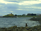 The harbour and priory ruins.