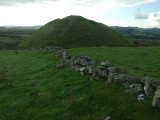 A tumbledown wall leads to the Norman motte,from the north.