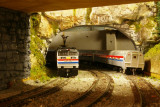 Amtrak E60 in tunnel cut