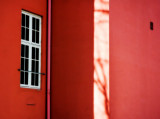 Shadow on pink house