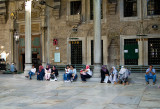 people waiting during prayer