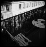broken chair on 5th floor terrace in Paris