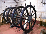 Manual steering wheels, 8 men/side=16 men to operate