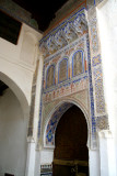 View of a 14th century mosque in Mekns with a painted door.