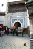 Horses that were carrying large boxes in Nejjarine Square Fs.