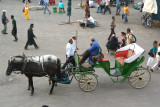 The horse drawn carriages are mostly for tourists.