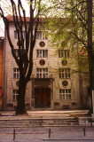 Unusual building in Ljubljana with circular designs on the faade.