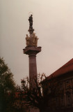 A 17th century monument in Ljubljana with a statue of the Madonna on top.