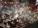 Oil lamps in front of the Kali temple, Dakshinkali, Nepal.