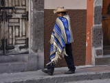 Poncho Man Walking Street