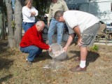 DRAINING THE WATER OFF OF THE HOT DOGS