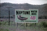 Neptune Waterbeds Billboard near Townsville, Australia. 1970s