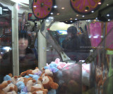 girl watching toys