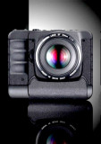 CANON EVIL LOOKS LIKE ? SAME FUNCTION AS DSLR BUT MUCH LIGHTER WEIGHT (WITHOUT MIRROR,WITH A VERY BIG MONITOR)