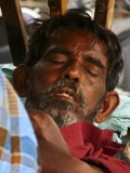 Sleeping rickshaw driver.jpg