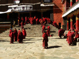 Monks in courtyard