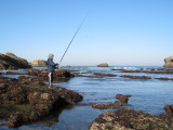 Low tide fisherman