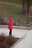 Lady in red in the still not so green park