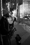 musician on Michigan Bridge