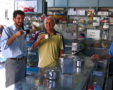 Cesar and Pedro take coffee at a roadside shop - Sao Carlos, Brazil