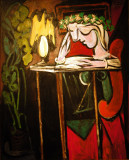 Girl Reading at a Table by Pablo Picasso, 1934